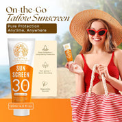 Woman in a sun hat and sunglasses holding sunscreen with product packaging and text about tallow sunscreen.