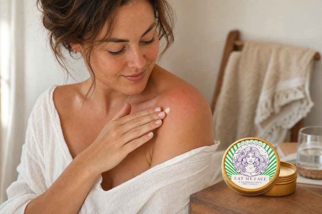 Woman with sunburned shoulders applying Eat My Face After Sun Balm at the beach