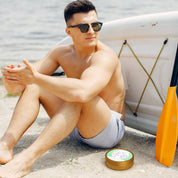 Beef Tallow After Sun Repair with Aloe & Cucumber balm by a beach for instant after-sun moisture and redness relief