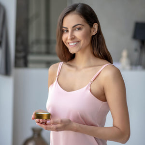 Beef Tallow Moisturizer - Original organic grass-fed tallow hydration cream jar held by woman for non-toxic skincare