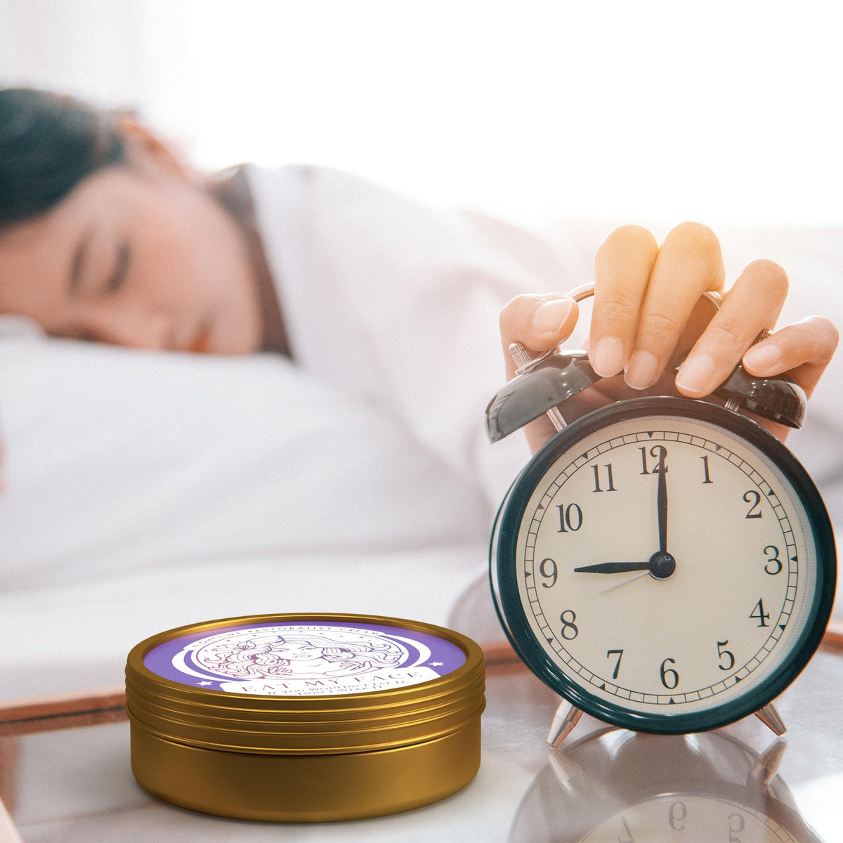 Beef Tallow Nighttime Restorative Cream with Lavender & Chamomile tin by alarm clock for bedtime skin repair