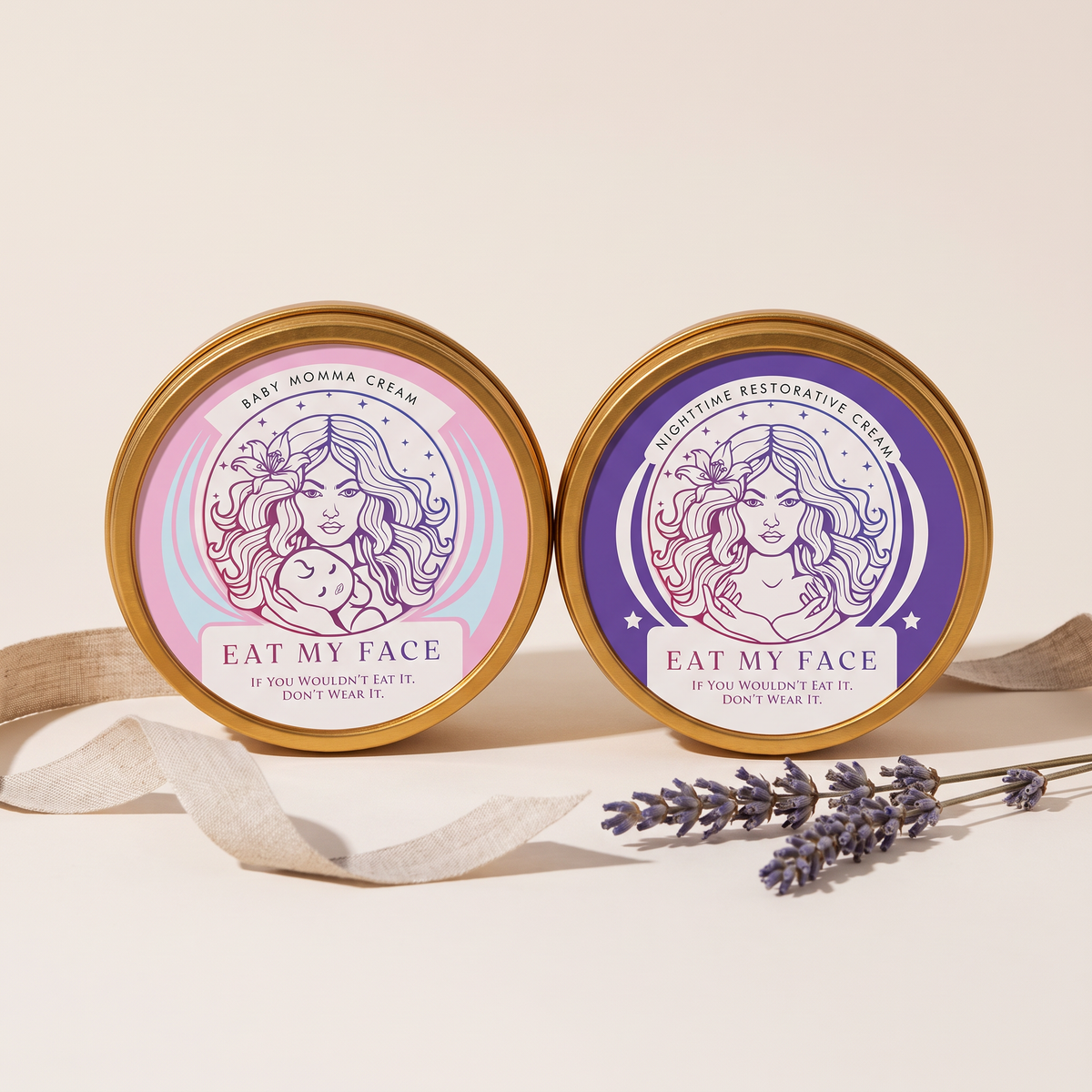 Day & Night Tallow Duo: Eat My Face Baby & Momma Cream and Nighttime Restorative Cream gold tins side by side with lavender and linen ribbon, grass-fed tallow gift set