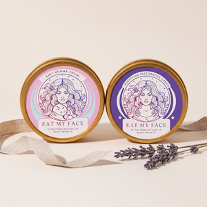Day & Night Tallow Duo: Eat My Face Baby & Momma Cream and Nighttime Restorative Cream gold tins side by side with lavender and linen ribbon, grass-fed tallow gift set
