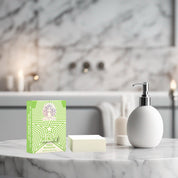 mint beef tallow soap bar on marble bathroom counter with minty green box and soap bar, refreshing peppermint spearmint cleanse