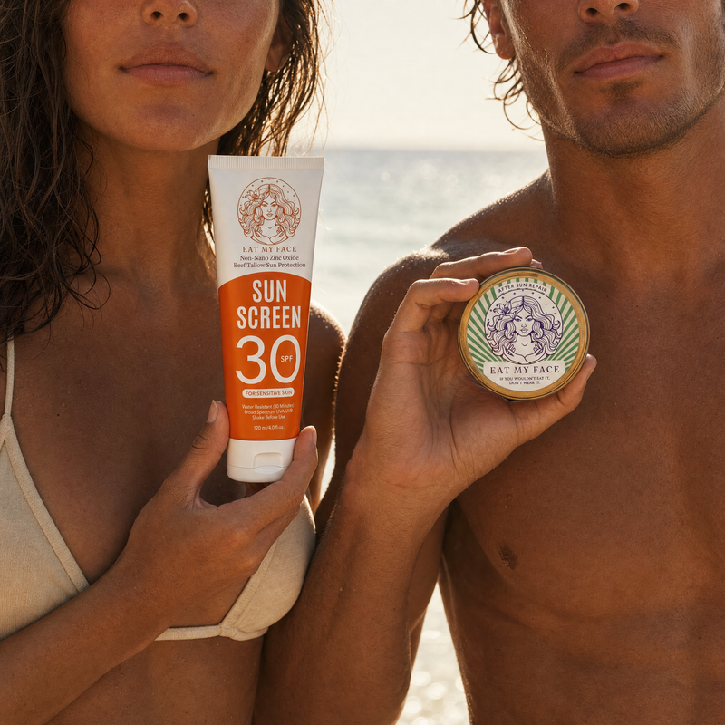 Beef tallow SPF 30 sunscreen tube and After Sun Repair tin held by a couple on a golden-hour beach, grass-fed tallow with non-nano zinc oxide, reef-safe sun-care duo by Eat My Face